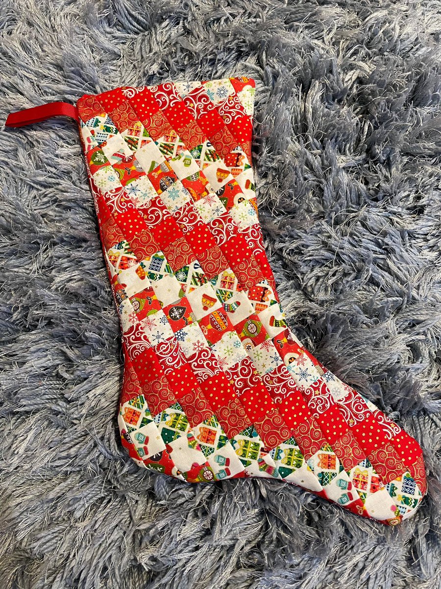 Gather_N_Sew's tweet photo. Wow! Our lovely customer Sophie sent me this photo of the Christmas stocking she made using our fabrics. The squares are so tiny and beautifully stitched. We are feeling festive ❤️🎄 #christmasstocking #gnsimadethis #customermake #sewingforchristmas #christmassewing #christmas https://t.co/Hca6aLlK5k