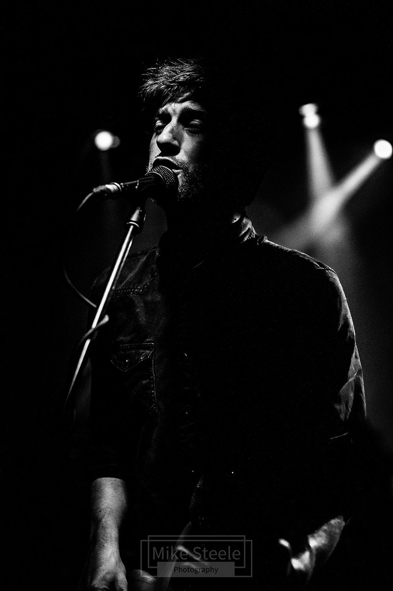 msteele_images's tweet photo. A rather dark portrait of Atticus Hall-Mc Nair on stage with Dig Lazarus.
@atticushm @Dig_Lazarus 
#diglazarus #gigphotography #blackandwhitephotography #nikond4 #blackandwhitephotography 
#blackandwhite #monochrome #bnw https://t.co/K2vY4Fs4ob