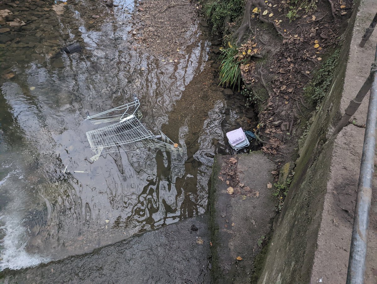 Vickstix1980's tweet photo. I pulled this trolley and microwave out of the malago last weekend on my dog walk. Reported the trolley on @Trolleywise sad to see it back in the river this weekend. There's also a stool in there. Can anything be done? @BristolWaste @KeepBristolTidy ? https://t.co/u6HRBZh0vA