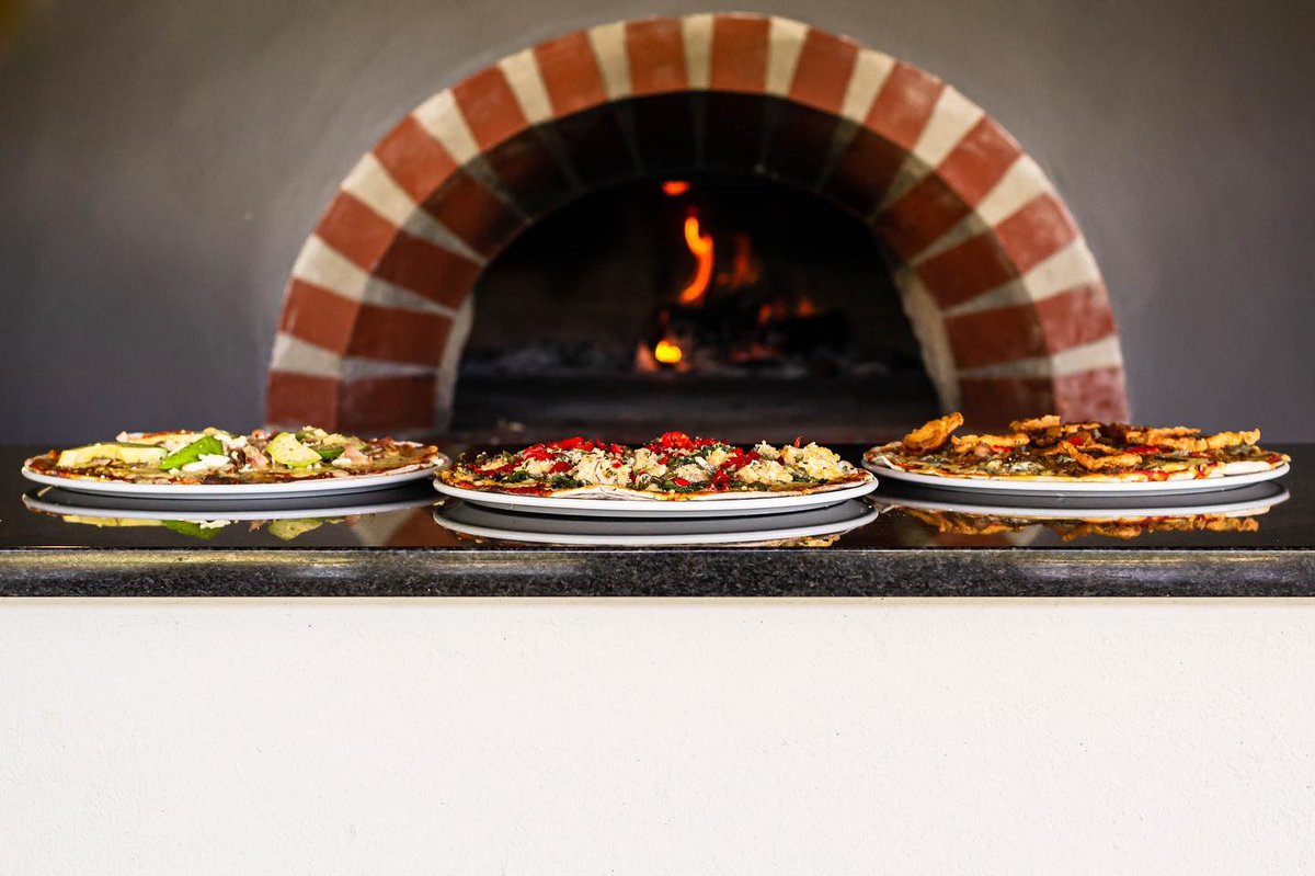 Hot, crispy, and fresh from the pizza oven straight to your table. Join us this weekend for divine wine, delicious eats and glorious views by booking your table on +27 (0)21 881 3636.

#familyrestaurant #pizzandwine #helderberg #stellenbosch #capewinelands #timetoeat
