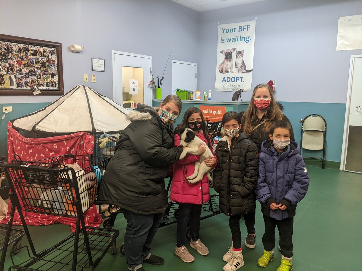 Kids for Character Club.  These kids were happy to deliver all the goodies to the animal shelter.  Stevie wanted to bring a puppy home she loved the little pup she held.