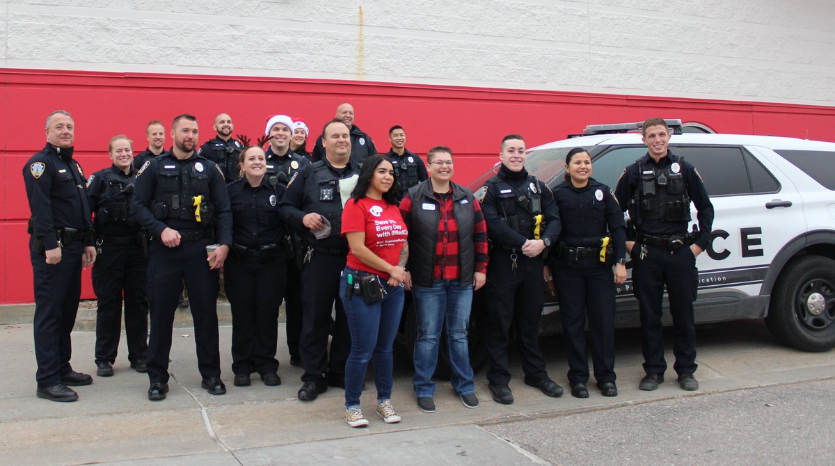 Lincoln_Police's tweet photo. The Lincoln Police Union charity Santa Cop partners with the @LPSorg Community Learning Centers &amp; @Target for the annual Shop w/ a Cop event. Ofcs are paired up w/ kids to shop for their wish lists. We are thankful for all those that help us spread cheer during the holidays. https://t.co/6w0Kt8Mtb8
