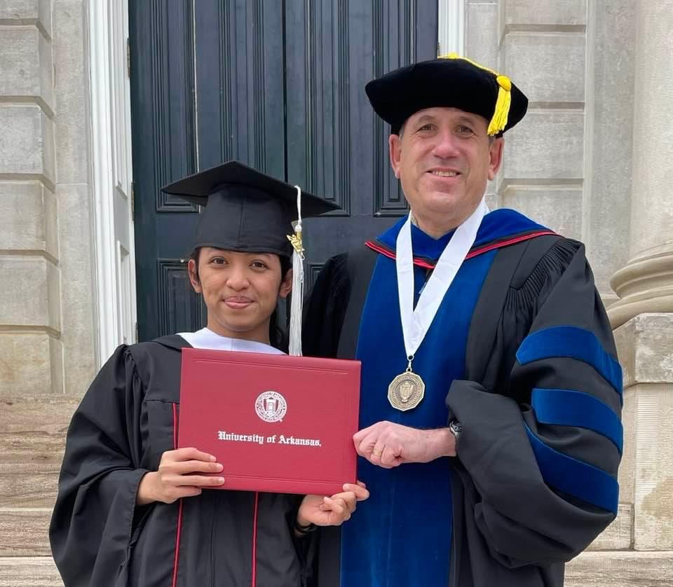 Proud of Putu Pujiantari!  When I first met her in Jakarta, less than three years ago, she barely spoke a word of English. Today she graduated with a masters degree from the University of Arkansas. January, she begins her PhD program here.