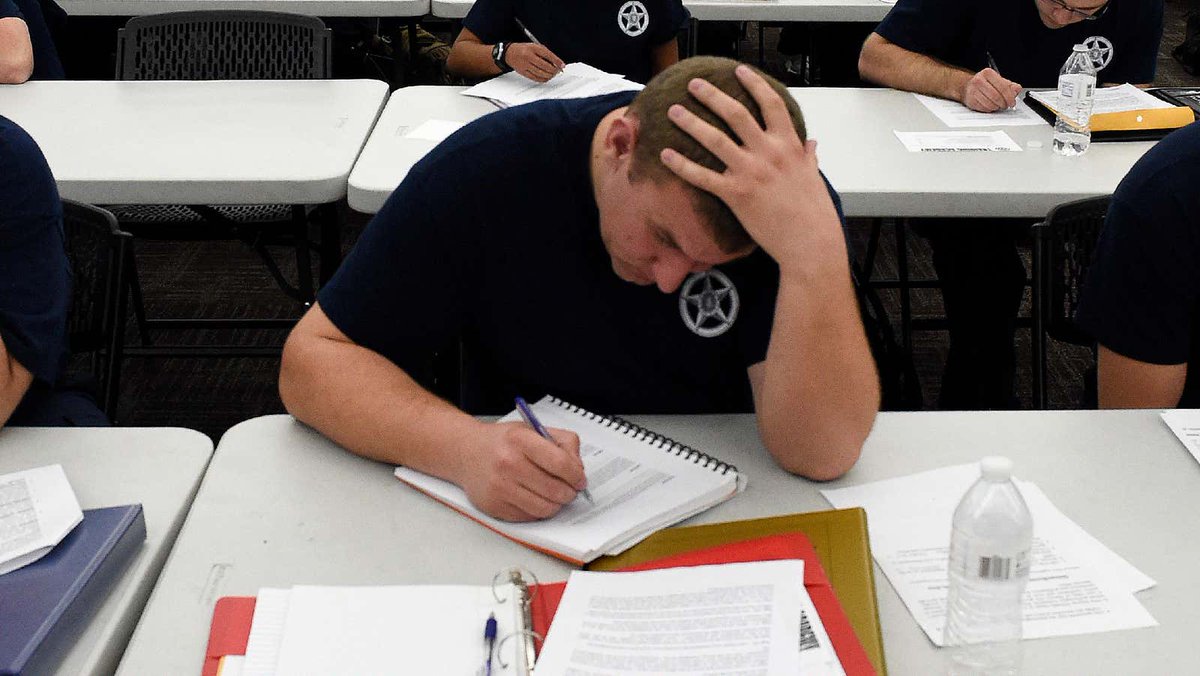 TheOnion's tweet photo. Cadet Studying For Police Academy Exam Just Skimming Over Deescalation Training He’ll Never Use In Real Life https://t.co/GXFwo1qozA https://t.co/nUsUvSPP8Q
