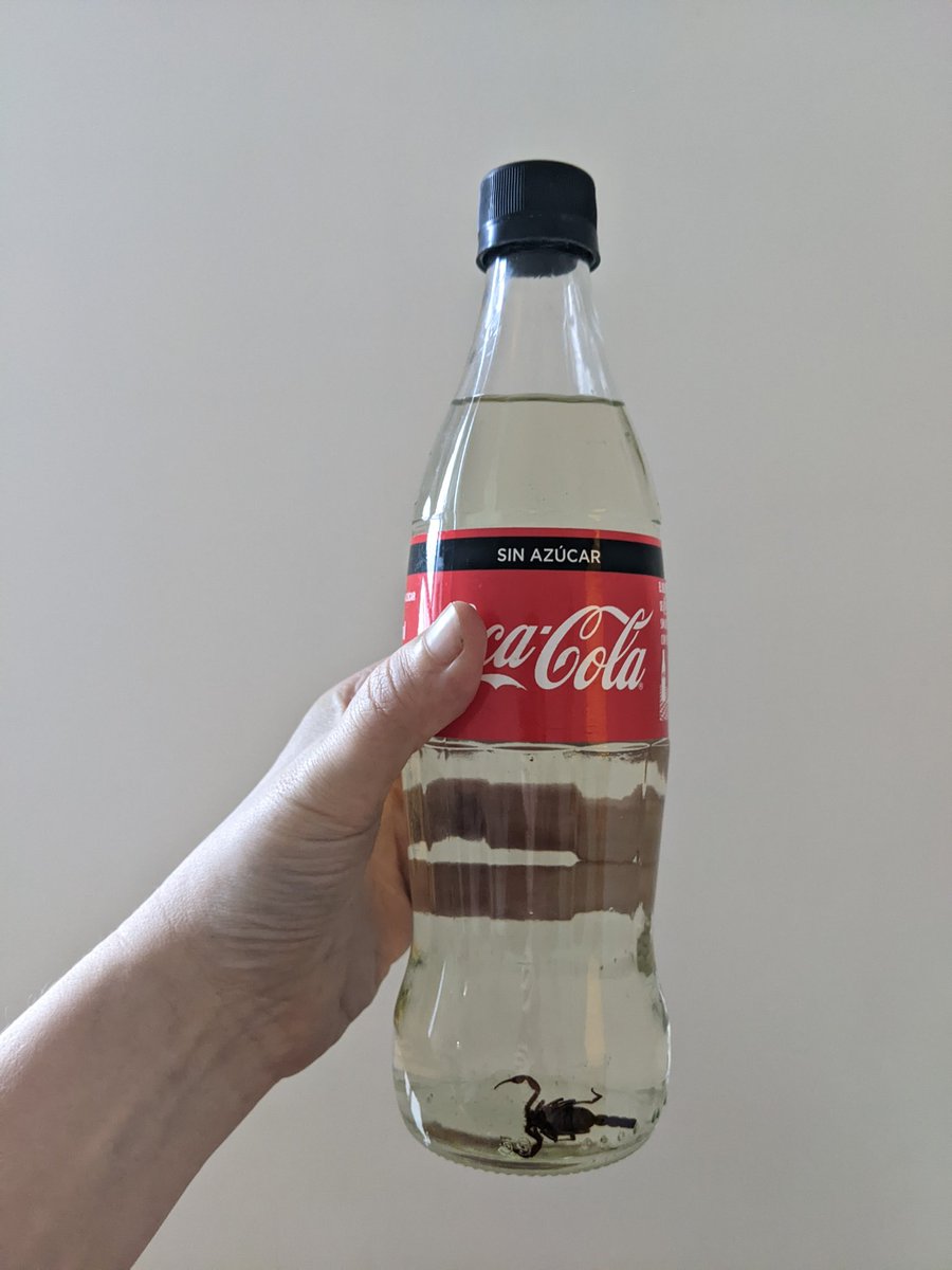 TheZoeverse's tweet photo. Bought this #mezcal from my friend's father. Lovely mix of #tobala and #cuish he made and mixed himself, as well hunted the #scorpion. Can't think of a better use for a Coca-cola bottle. #fuckcoke https://t.co/4I43yKJlng