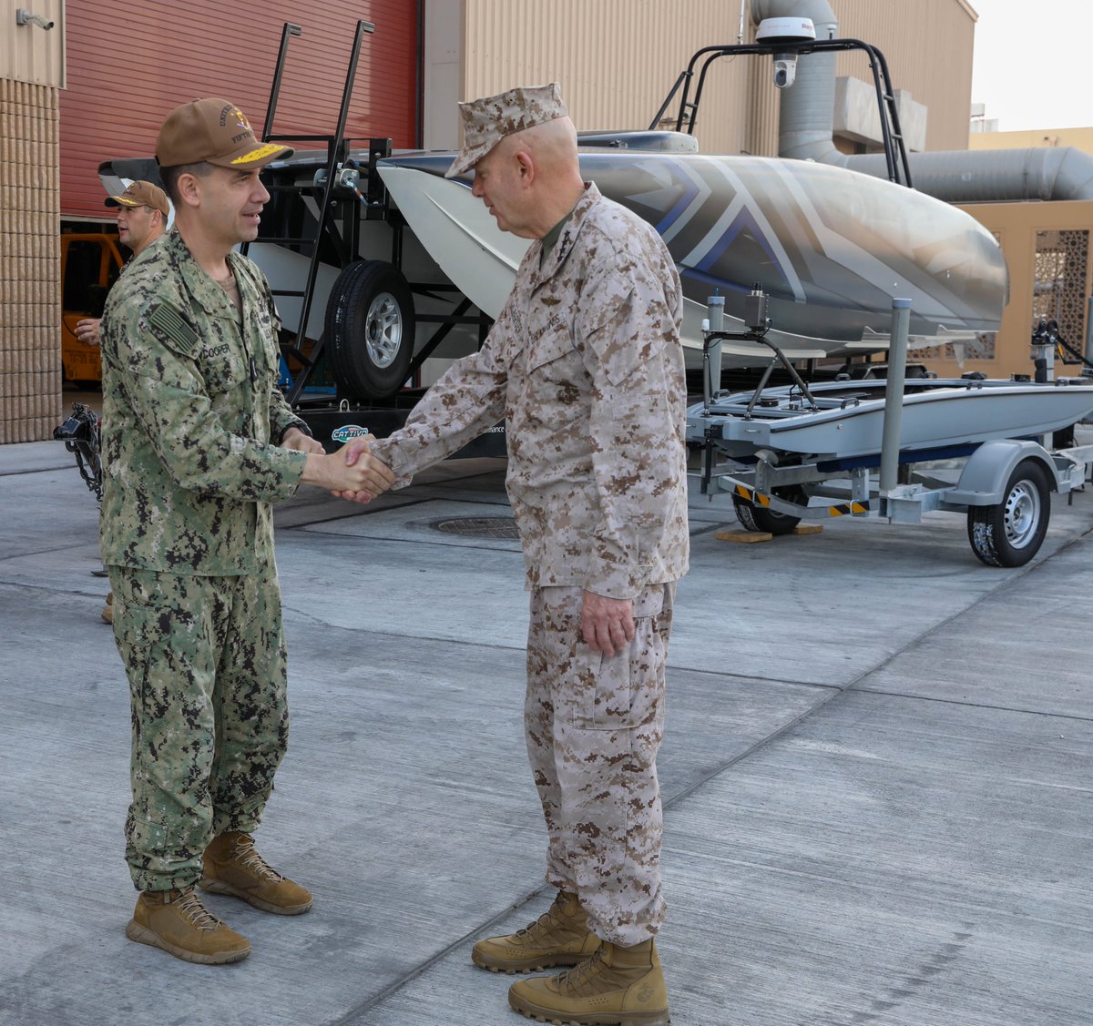 Gen. David H. Berger, commandant of the @USMC, right, met with Vice Adm. Brad Cooper, commander of U.S. Naval Forces Central Command, U.S. 5th Fleet and Combined Maritime Forces, in front of a Task Force 59 display at @NSA_Bahrain, Dec 16.