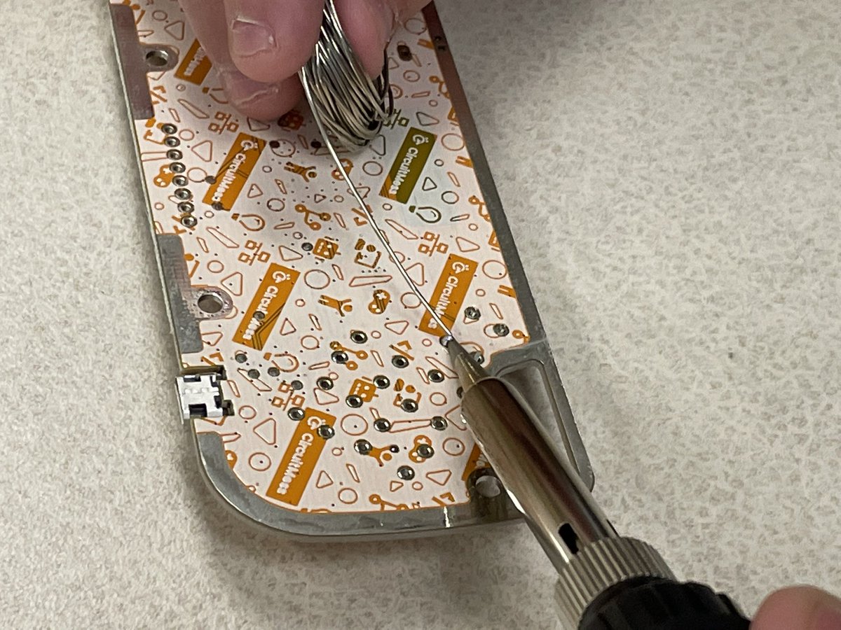 ClaypoolStem's tweet photo. Some of our robotics team is learning about PCBs, electronics, and coding! They’re building their own handheld game console! Today they soldered their buttons in place. Next week is the LCD screen. Soon they will be using C++ to code their own arcade games. #STEM #WCSMission https://t.co/UfITMDtmdd