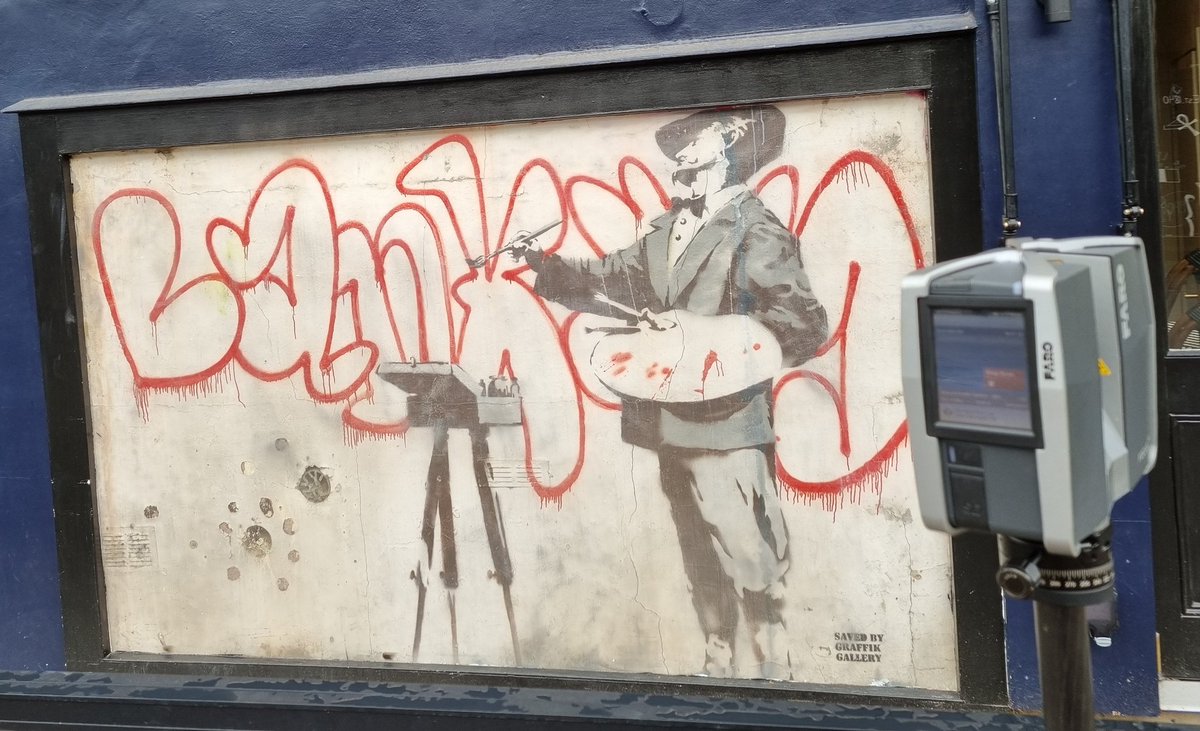 Banksy artwork just off Portobello Road, London. Out laser scanner on the right there.