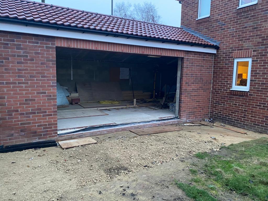 RevealDoors's tweet photo. On site this morning in Leeds for installation of some Solarlux bi-folds.

It's part of a garage conversion to create accommodation for our client's elderly mum, and it's quite an unusual order of a 1 plus 3 configuration of doors.

 #bifolddoors #bifold #bifolds #leeds https://t.co/iFbuu6YEnO