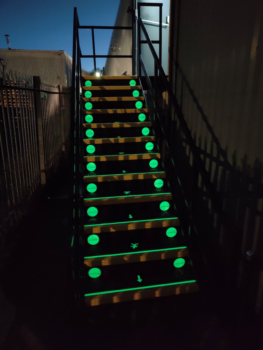 A recent fire exit route we completed using our step covers to totally transform these stairs. #iglo #glowinthedark #fireroute #fireescape #antislip #safety