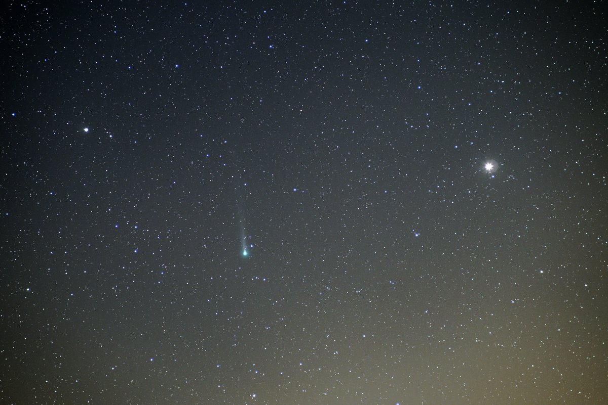 suthers's tweet photo. I took several shots of Comet Leonard (C/2021 A1) from Walmer this morning using a fast 85mm lens stopped to f2 and an old Olympus OM 135mm lens wide open at f2.8. I've stacked just a few images from each to avoid comet trailing as it was moving quite swiftly. #astrophotography https://t.co/ZlOsPSLkLD