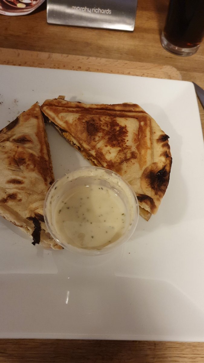 Chicken balti in garlic naan toastie. What a Time to be alive