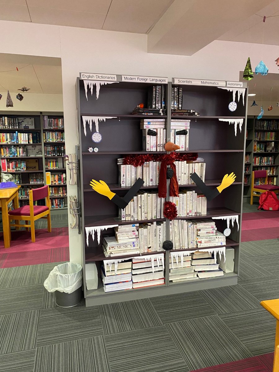 Library_EHS's tweet photo. More decorations! We have our lovely shelf snowman and a book tree! #library #librarydisplay #booktree #snowman https://t.co/gwbd1BsxWF