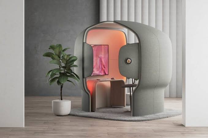 Techthirsty's tweet photo. We could totally sink into this little nook. This is not sci-fi. 

Are you ready for a hybrid workspace? Then be ready for this #Microsoft workspace. 

#hybridwork #workspace #flowspace #cubicle https://t.co/VJ82Q9ewtR