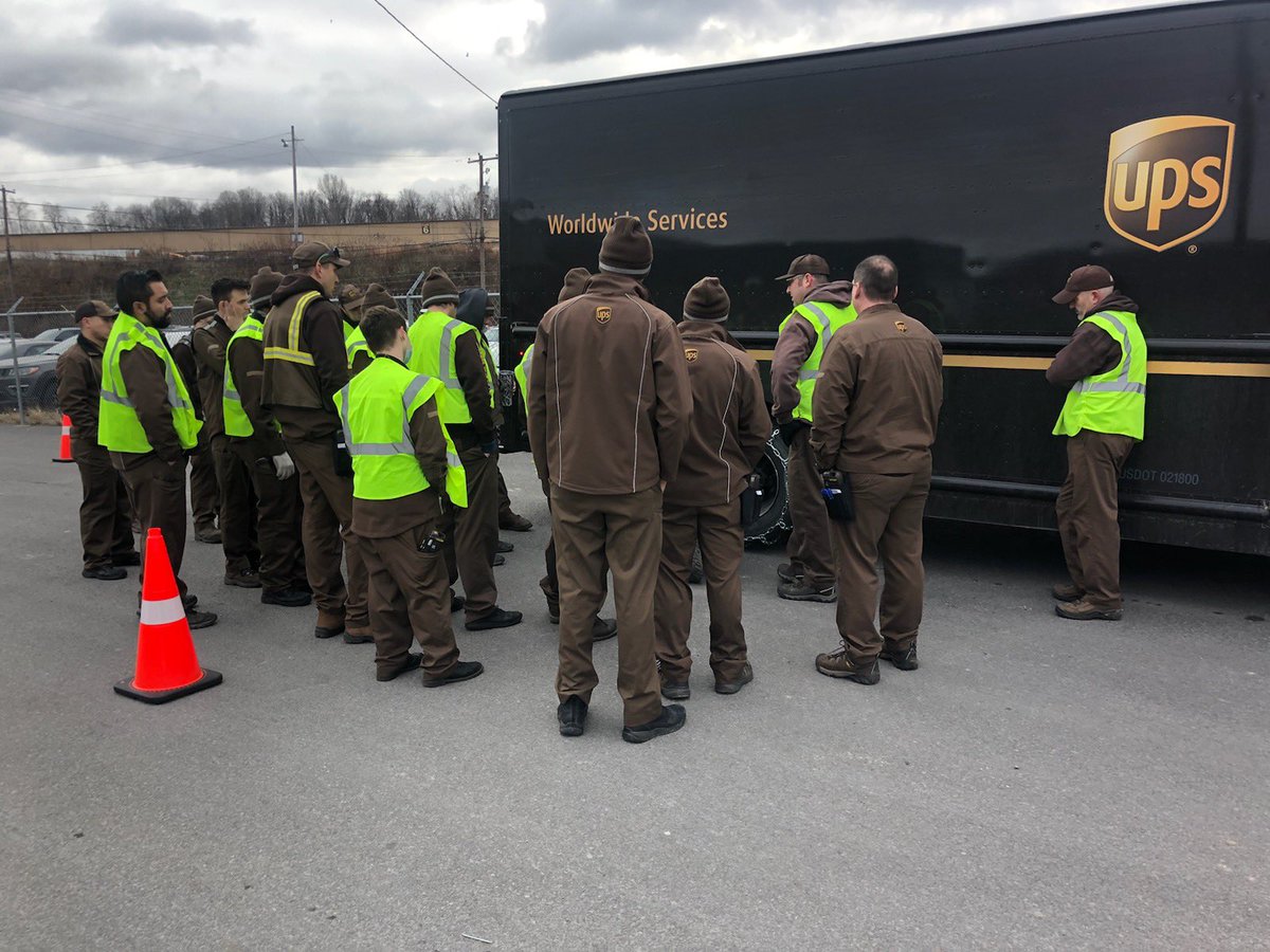 Scranton Facility safety committee getting drivers prepared for the snow by doing a chain demo.