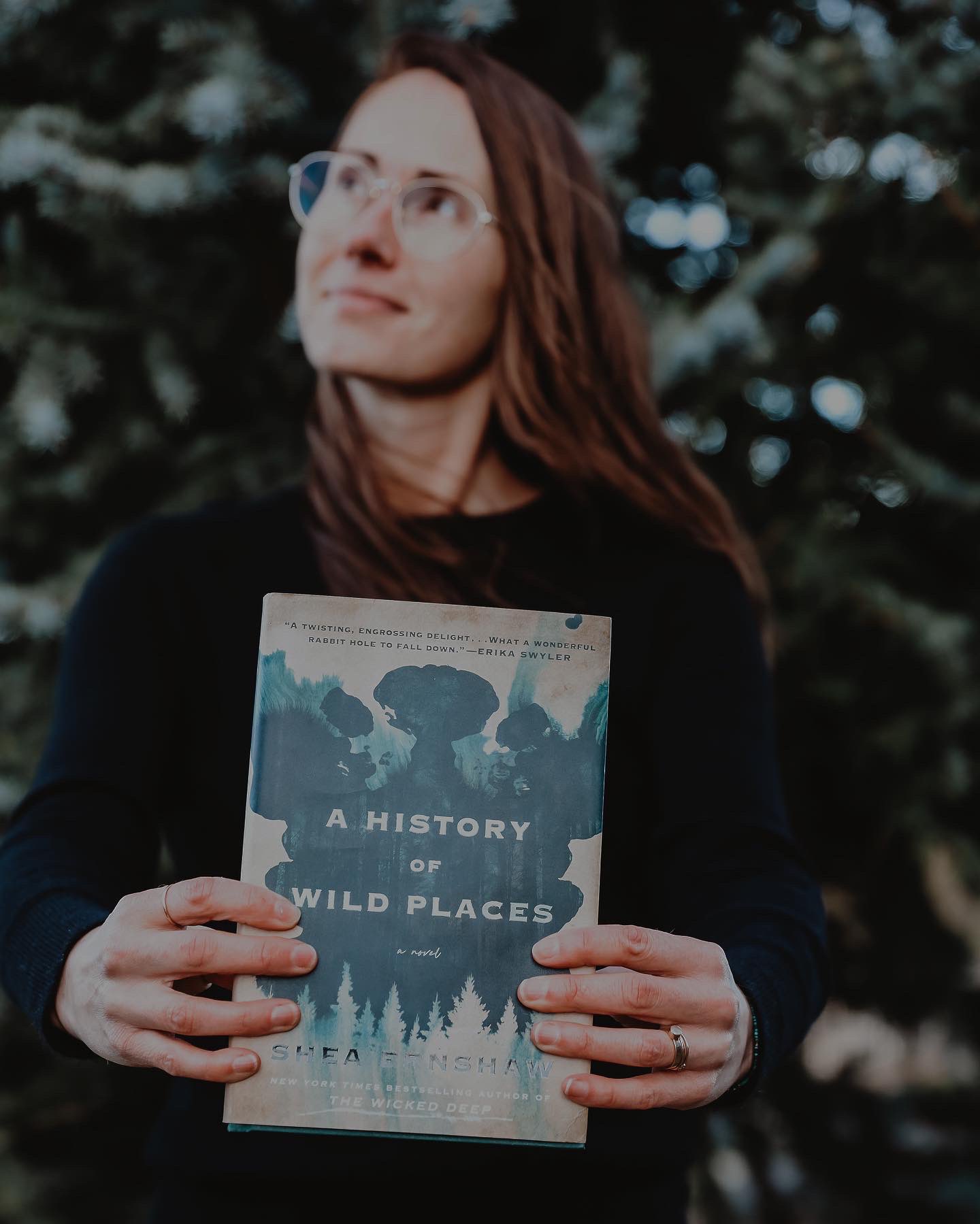 The author holding her novel