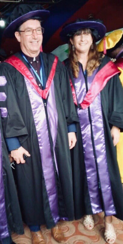 Gulu_Mission's tweet photo. Trustees @helen_lock &amp; @steve_lock after receiving their honorary doctorates in mission recognising their work in Uganda. 

“Thank you to everyone who has stood alongside us in our work with Gulu Mission Initiative, we are so grateful.” 

- Helen &amp; Steve https://t.co/4UCnBgWmoZ