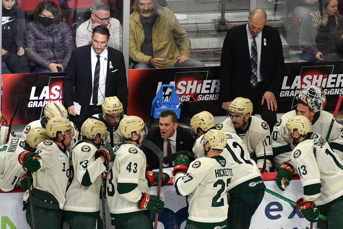 TheAHL's tweet photo. Nolan Yonkman and Nate DiCasmirro both played pro hockey at a high level, but both are experiencing a new challenge as first-year AHL assistants with the @IAWild.

📝: @MCourtneyPR | https://t.co/d0438I9OYb https://t.co/x8lykmFdo6