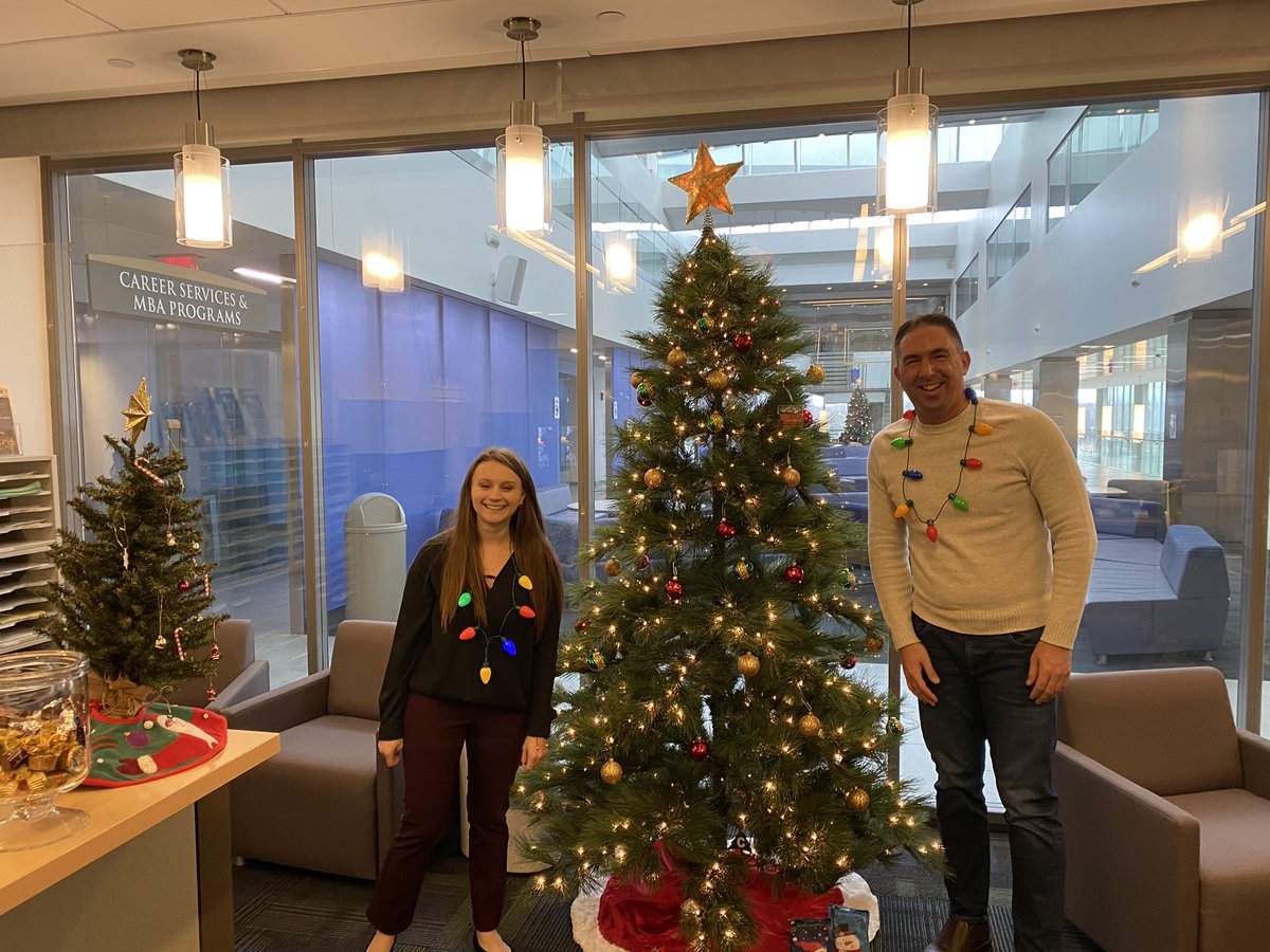 DamiraUAlbBiz's tweet photo. This is what happens when you become an advisor for Business / Accounting: totally unplanned matching light necklaces! Who wore it best? @JasonUAlbBiz & Krystal Greiner #AcdAdv #ualbany #HappyHolidays2021 https://t.co/3sSvU0JNP9