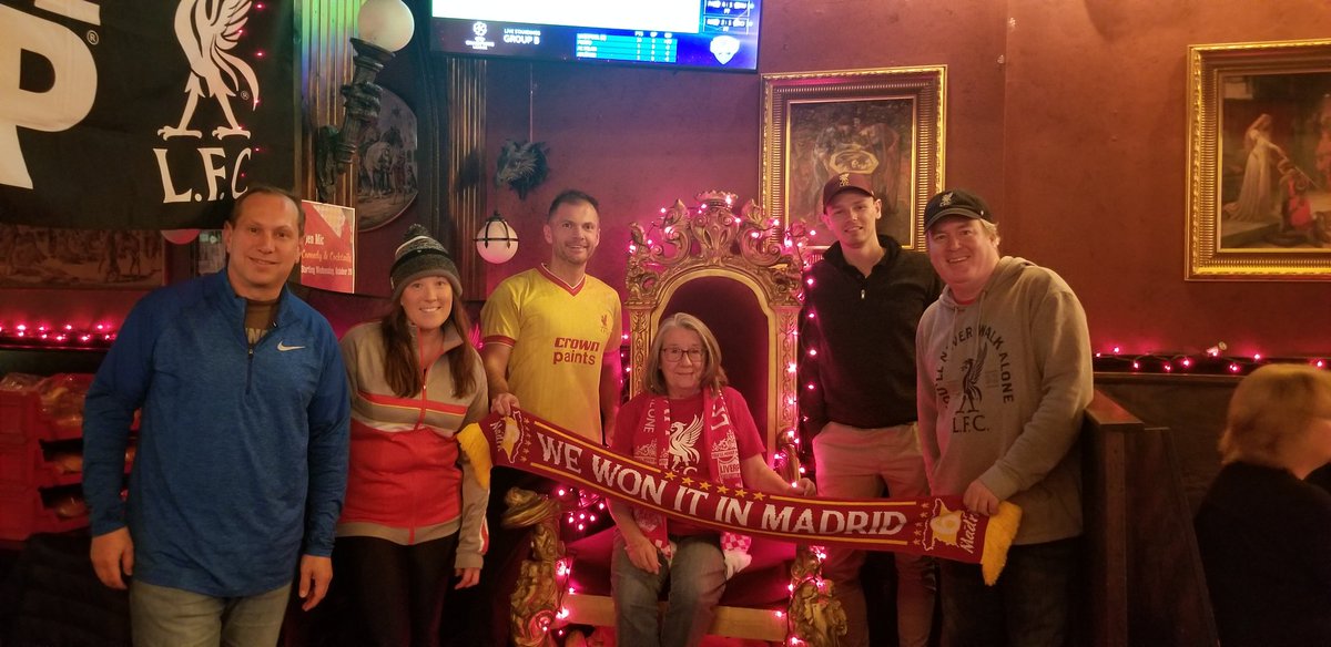 LFCDesMoines's tweet photo. Our "Mo" sitting on the new throne at the Mile. Mary Moore approves of Mo tying it up to! Up the Reds! #YNWA #LFC #UCL #wewonitsixtimes #OnToNumber7 https://t.co/H7qA6jH3ik
