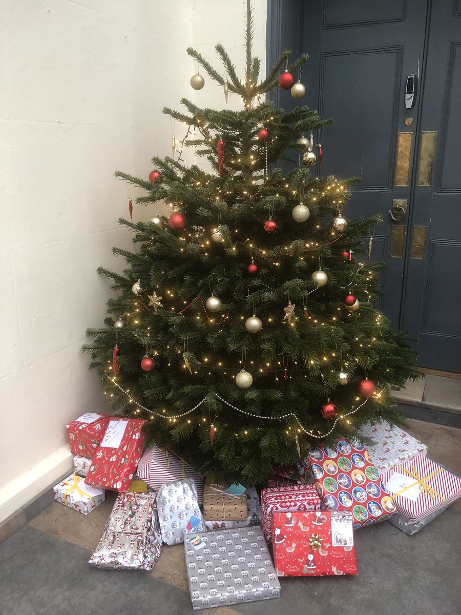 WoodcoteHouse's tweet photo. It was Christmas jumper day today in support of Valley End Cricket Club’s Chari-Tree appeal. @WoodcoteHouse parents generously donated presents & Mr Monk went shopping for hampers. All of these will be given to local families in need. #woodcotecommunity @ValleyendCc https://t.co/i7Qa45yl8J