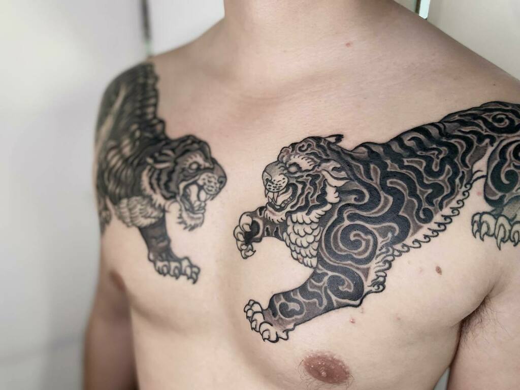 Tiger Tattoos - Tattoo Insider | Tiger tattoo, Chest piece tattoos, Chest  tattoo men
