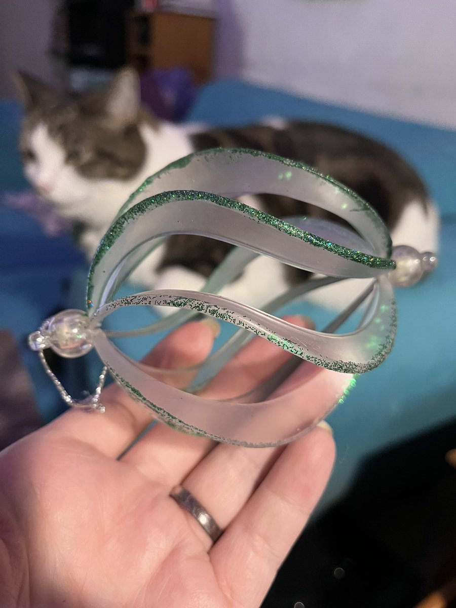 ElliottRook's tweet photo. The green glitter has worn off this ornament in the last decade so I’m repainting it with @holotaco #EverythingIsPine :) I love using mail polish on things that will last longer than my manicure! https://t.co/raDZK79SDj
