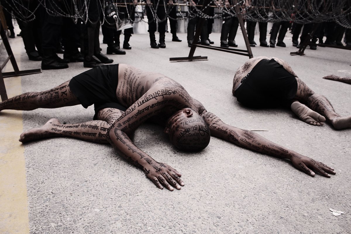 CalligraphyRes1's tweet photo. 'Culture of Silence'
Protest Performance Art
by #Artree
23 July 2016
#Kathmandu, #Nepal
(for medical education reform)
artists: Hitmaan Gurung, Mekh Limbu, Subas Tamang, Lavkant Chaudhary, Bikash Shrestha
#performanceArt #protest #body #calligraphy #writing https://t.co/8iySFl93tf
