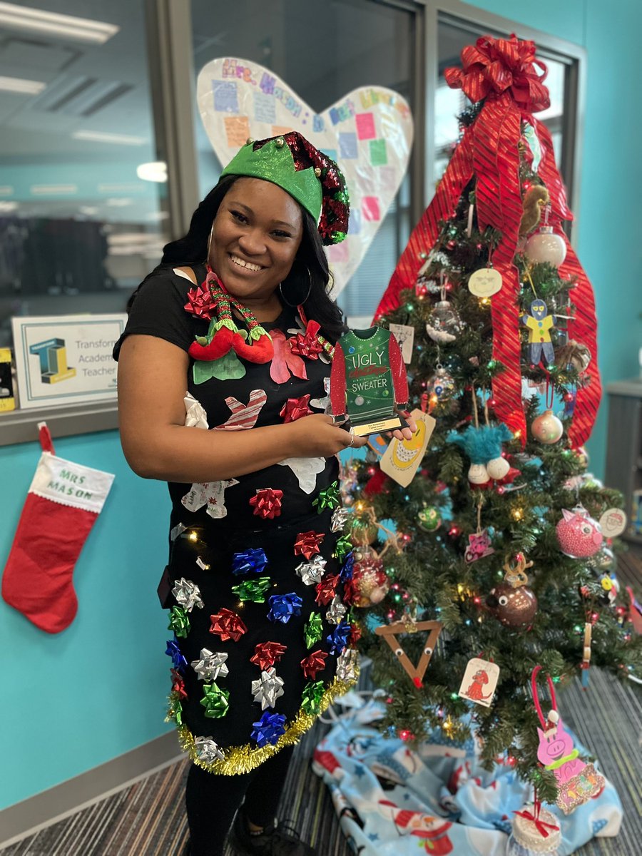 Introducing <a href="/FoxKISD/">Fox Elementary</a> ‘s 2021 Ugly Sweater Contest winner!!! Ms. Davis makes ugly look good! 💜