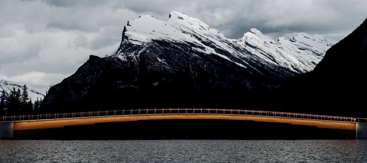 banffmayor's tweet photo. Excited to officially kick off construction of #Banff’s new pedestrian bridge, the Nancy Pauw Bridge. A huge thank-you to the funders and partners who helped to make this active modes dream come true. Can’t wait to walk, run, and bike across it by the fall of 2022! 🎉 https://t.co/RDIgZ7Qj6Z