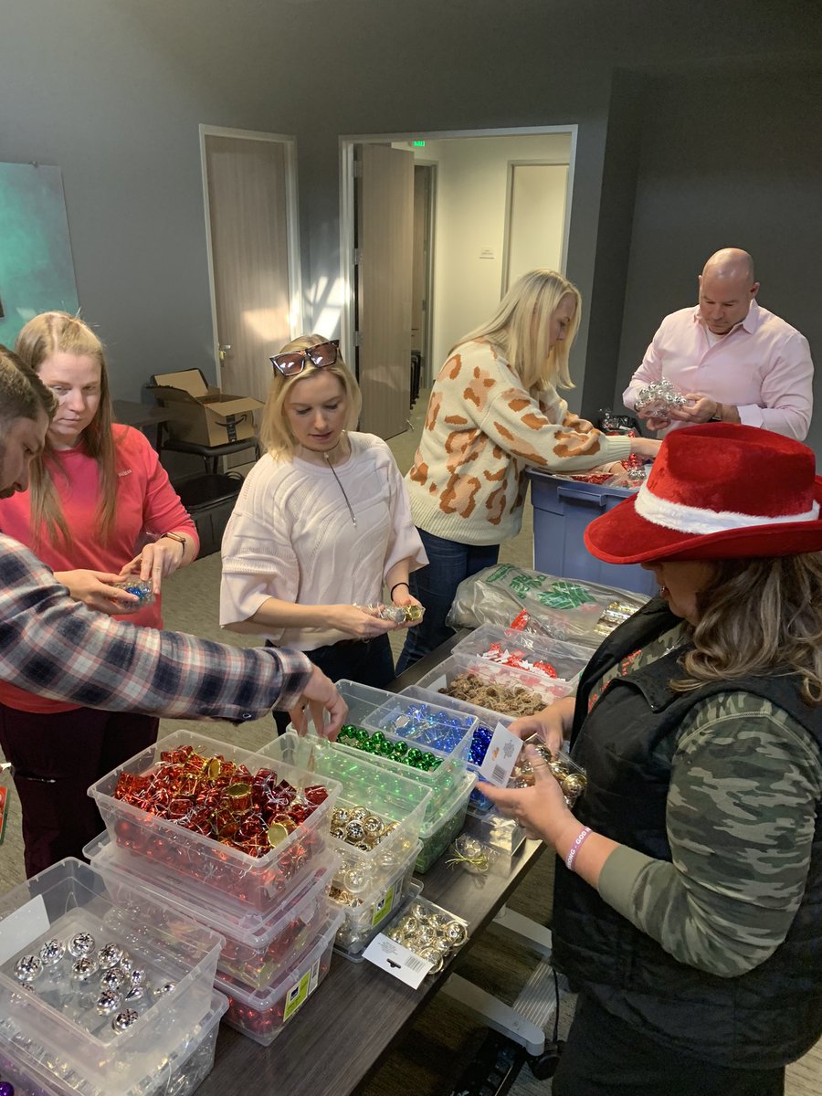 BradysBridge's tweet photo. So grateful for this wonderful team of professionals putting together another 100 + Christmas tree packages today! Thank you @AustinAptAssoc for supporting this effort each year! We couldn’t do it w/out you!  #christmastrees #children #hospital #BeALight #aaagivesback https://t.co/jtg0zbLlX1