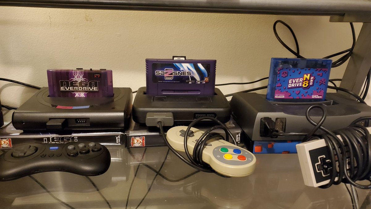RobSnowlock's tweet photo. I may buy dumb things with my money, but having this lined up makes me a bit happy.

Three @analogue systems (genesis, snes &amp; nes) paired with three everdrives from @StoneAgeGamer https://t.co/vdLZd1R18R