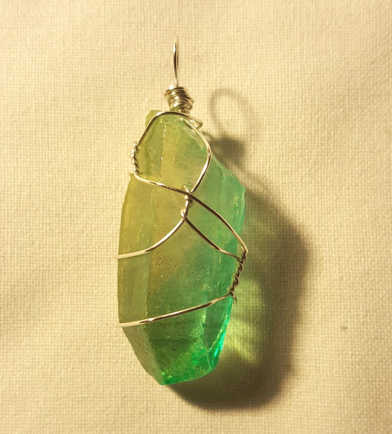 T_H3n5's tweet photo. Excited to share the latest addition to my #etsy shop: Green Aura Quartz Pendant #green https://t.co/QfZVmMkJYi