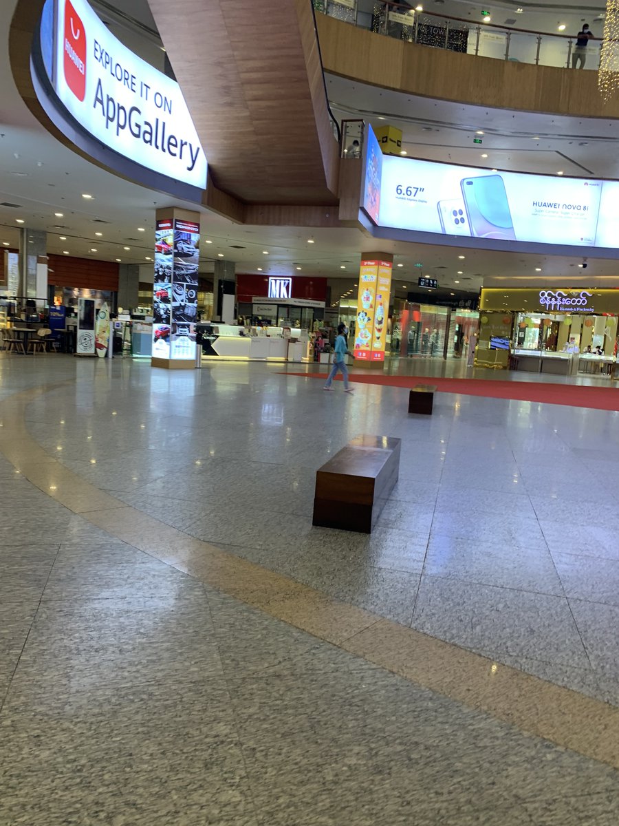 IrrawaddyNews's tweet photo. It has been nearly two weeks since Yangon residents began boycotting Myanmar Plaza after its security guards attacked anti-regime protesters on Nov. 25. On Wednesday, after the 12th day, the city’s popular shopping mall was still deserted. 

Related story: https://t.co/9JiFUBNp9r https://t.co/OmnL8oVGzj