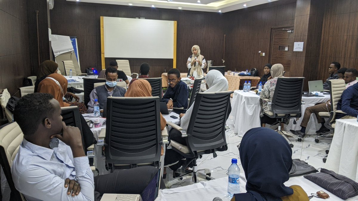AbeerFoundation's tweet photo. Our Board Member @Sahra_Noor shares her experience and process for  @hellocaafi with the @UNDPSomalia @SIMADiLab accessibility tech innovation #hackathon participants in #Mogadishu #Somalia #DisabilityInclusion #DisabilityTech https://t.co/U7NWe98rUA