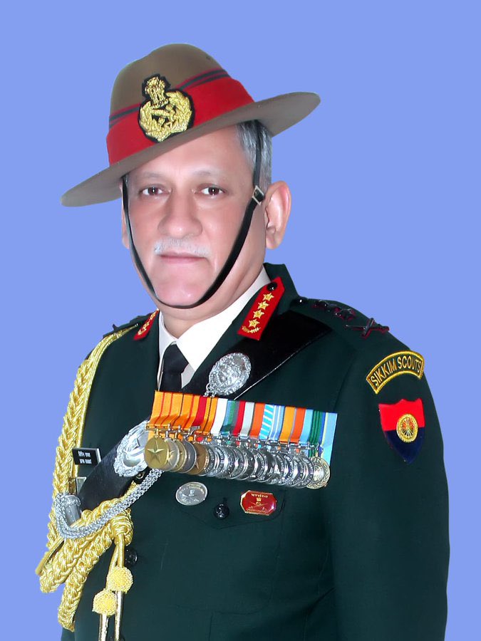 dpradhanbjp's tweet photo. Pained at the passing away of the Chief of Defence Staff Shri Bipin Rawat, his wife Mrs. Madhulika Rawat and 11 others on board the IAF helicopter that crashed near Coonoor today. A decorated general, Shri Rawat served the armed forces with distinction and passion. https://t.co/NdYpG6zA2d