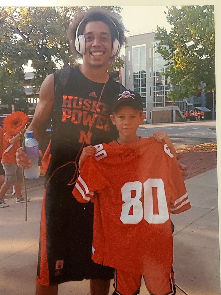 huskerjen's tweet photo. @AFRO_THUNDER80 I believe this was 2014, first game of the season. You were walking down the street away from the stadium after the game.  My son already had the signed jersey. You were so kind to take the time for a quick pic. https://t.co/GKkPBd9FpU