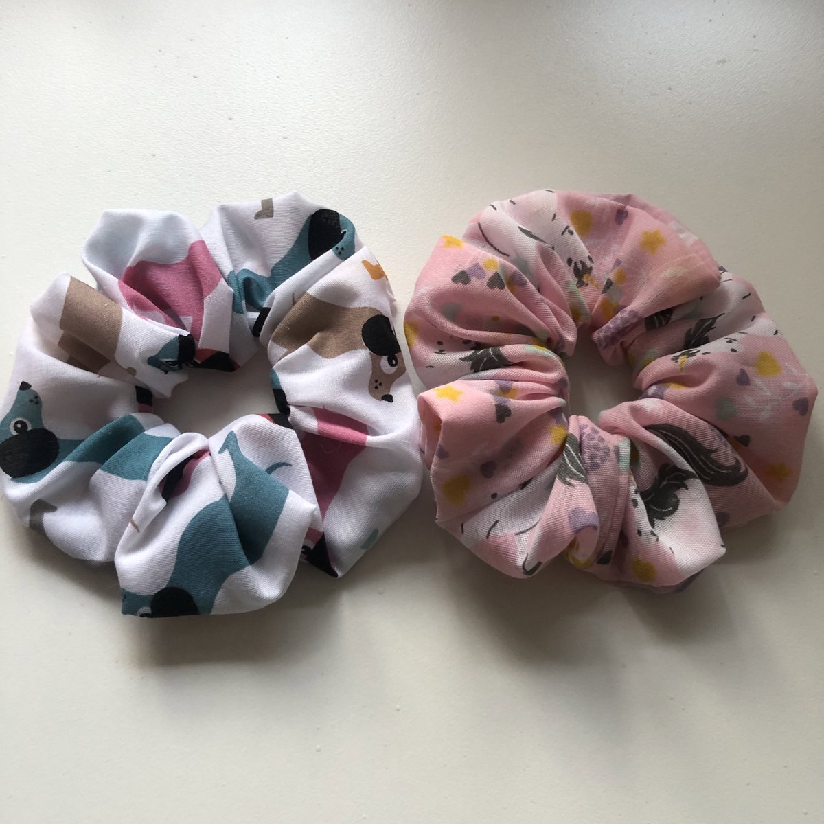 georgiakdesigns's tweet photo. Looking for some stocking fillers? We have small scrunchie sets available on Etsy in unicorn and sausage dog prints. Perfect for children and shorter hair. https://t.co/j6IAx84Rau