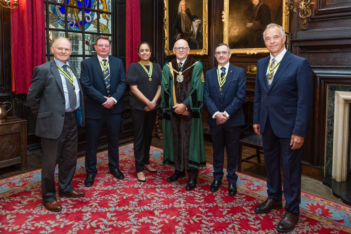 spectaclemakers's tweet photo. Images from yesterday: new Liveryman David Clarke (@ClarkieGB7, Director of Services for @RNIB) with  @KValentine67 and guide dogs Dennis &amp; Dottie; 5 more new Liverymen (profiles coming soon) &amp; a flaming #Christmas Pudding courtesy of @PartyIngredient. What a lovely occasion! https://t.co/TcUSDDIVOi