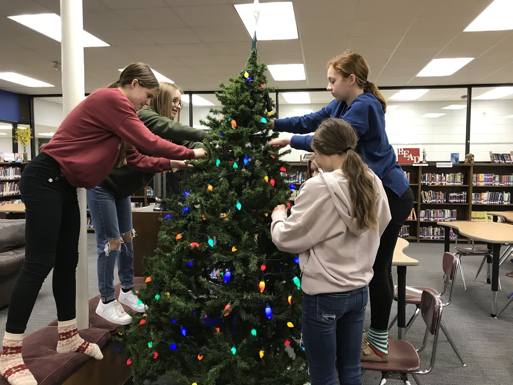 StarCitySchools's tweet photo. The @scmiddleschool Beta Club is sponsoring a Toy, Sock, & Glove Comm. Service project this month. Socks & gloves decorate the tree in the library. The socks are sent each year to AR Children's Hopsital & the toys/ gloves support local needs in our area. #SCMSstrong #BeTheBest https://t.co/z8X9ADQYb8