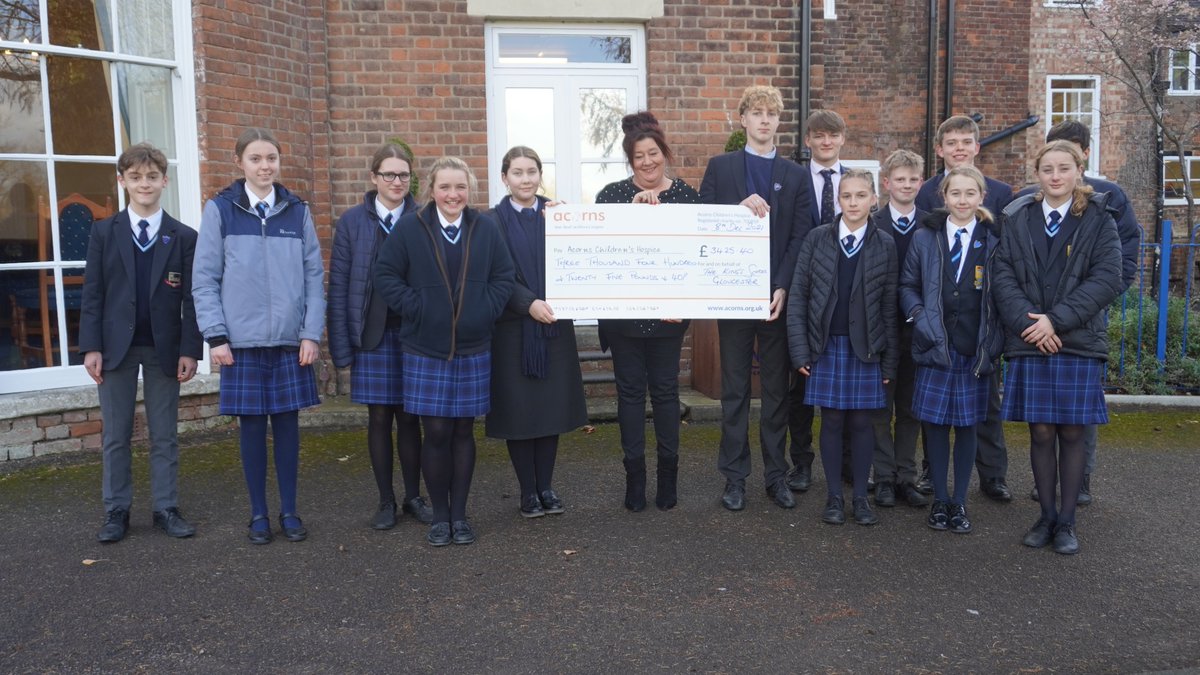 We welcomed Mel from <a href="/AcornsHospice/">Acorns Children's Hospice</a> into King's today. The Hospice has been Serlo's House charity for the last two years and the House Captains were delighted to present her with a cheque for £3,425.40 from our fund-raising events <a href="/KSGHouseevents/">House Events | The King's School</a> #KingsSchoolCommunity