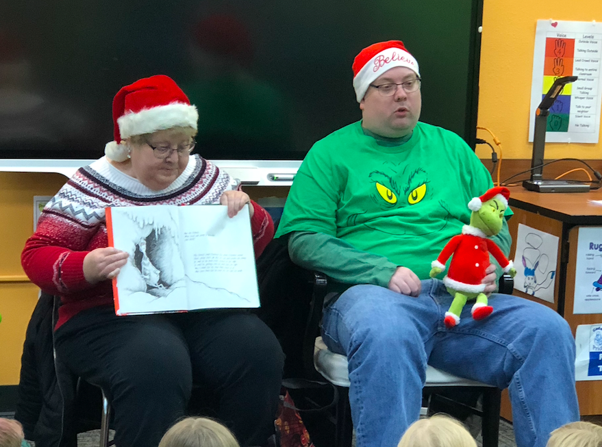 Elma451's tweet photo. Crestwood Elementary K-2 students enjoyed hearing Adam Schmitt retell the story of "How the Grinch Stole Christmas."  Adam is a graduate of @HowardWinnCSD and has come back to school to share his talent with our young readers for many years. @DouglasASickles https://t.co/xoHe17XyBO