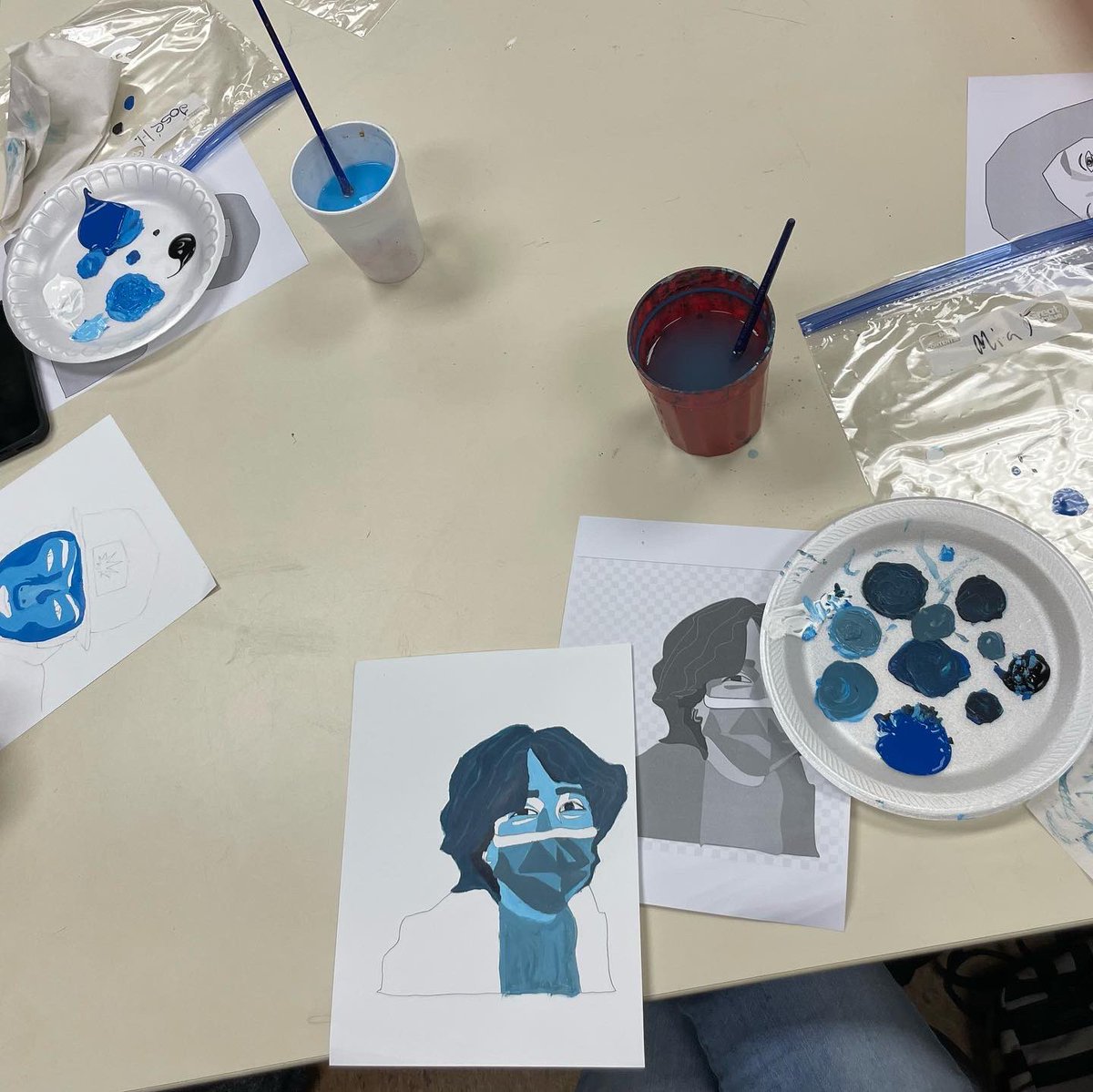 ErinField19's tweet photo. Last week Art 2 students created vector portraits on google drawing and this week they are using acrylic paint to recreate their portraits.  I love watching my students learn new mediums and grow as artists! ❤️❤️❤️ https://t.co/vL9oDxkR71