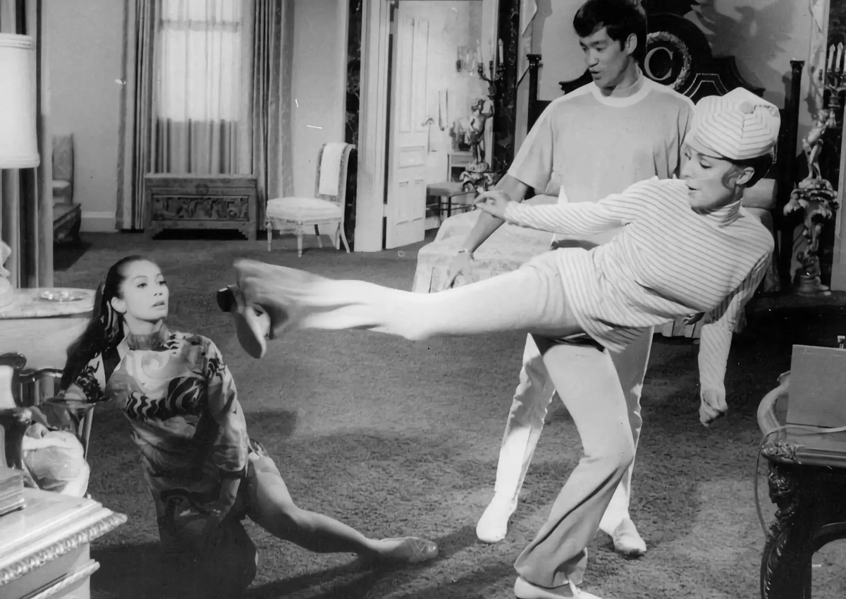 Nancy Kwan, Bruce Lee and Sharon Tate photographed during rehearsals on the set of The Wrecking Crew (1968)