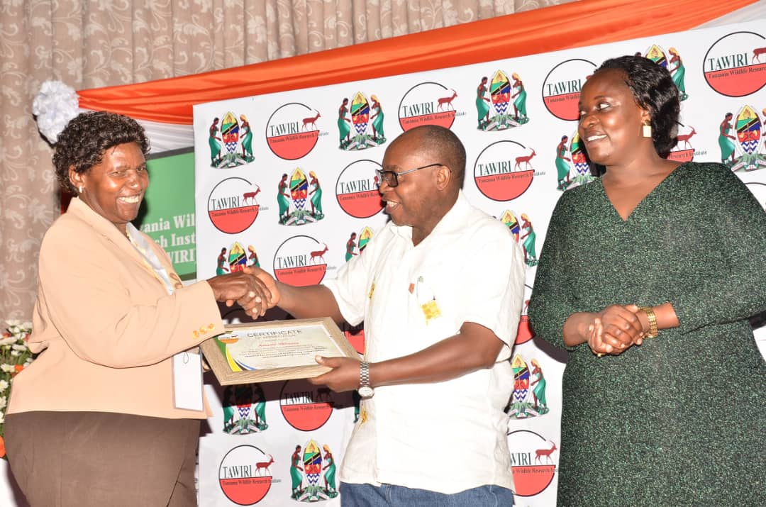 Geography_UDSM (@udsmgeography) on Twitter photo Prof. Salome Misana <a href="/UdsmGeography/">Geography_UDSM</a> receiving a Certificate of Appreciation from Hon. Dr. Damas Ndumbaro, Minister for Natural Resources and Tourism, following her Keynote address at the 13th TAWIRI Conference. Looking on is Deputy Minister Hon. Mary Masanja. Prof. Salome Misana <a href="/UdsmGeography/">Geography_UDSM</a> receiving a Certificate of Appreciation from Hon. Dr. Damas Ndumbaro, Minister for Natural Resources and Tourism, following her Keynote address at the 13th TAWIRI Conference. Looking on is Deputy Minister Hon. Mary Masanja.