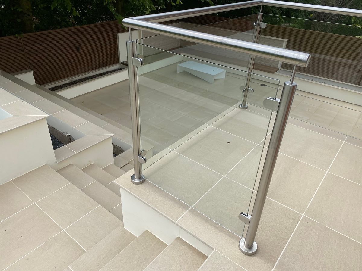 Porcelain at its best, difficult project passed on to use. 
#porcelain #paving #firepit #stainlesssteelbalustrade #steps #waterfeature #compositefencing