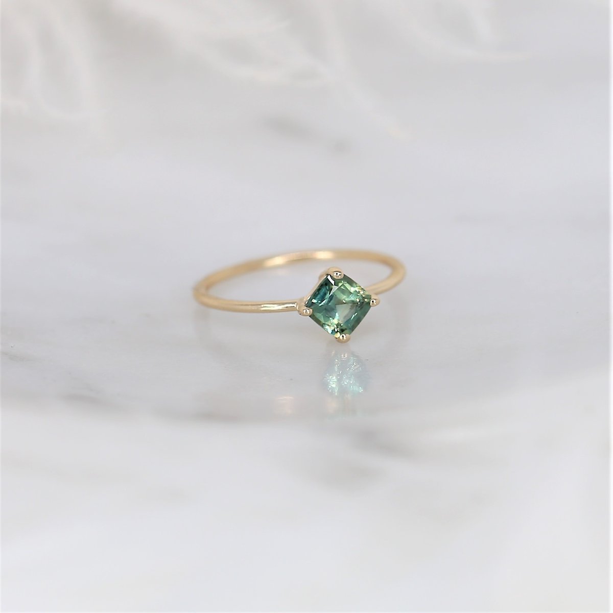 We have another new Ultra Petite Kiki in the house! This 0.59ct version shows off a cushion cut peacock teal sapphire that adds a pop of color to the minimalist piece. Learn More >> https://t.co/pppHObTpba https://t.co/ehb8gq3L1G