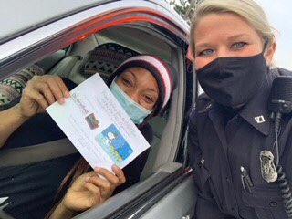 novipolice's tweet photo. A young mother of two recently moved to Michigan. She was having mechanical problems with her car when #NoviPd came along. A $50 @Walmart gift card will help with repairs. #WelcomeToMichigan @cityofnovi @DMCreditUnion #KindnessIsContagious https://t.co/KhONhxoPT9