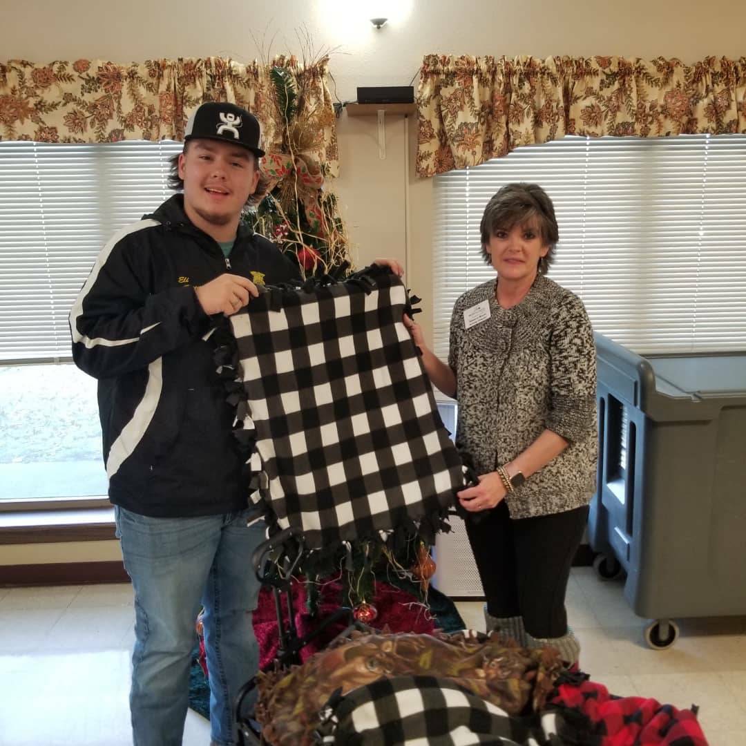 NeoshoFFA's tweet photo. Today FFA members were able to present lap blankets to residents at Medicalodges Neosho. These blankets were made at our November FFA meeting thanks to a @NationalFFA Day of Service mini-grant.

#livingtoserve #serviceproject https://t.co/PLUo8YIdeL