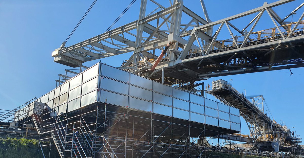 LayherScaffold's tweet photo. Corrosion remediation work on coal terminal stacker-reclaimers generally involves noisy machinery that frequently has to be operated on a 24-hour timetable to bring reclaimers back on-line as quickly as possible.

https://t.co/nhsXs4JYuZ https://t.co/2cQp7fiD5E